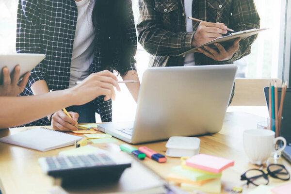 Businessmen teamwork brainstorming meeting.