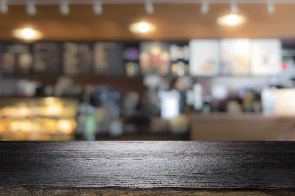 Tampo da mesa de madeira no café café balcão bar fundo — Fotografia de Stock