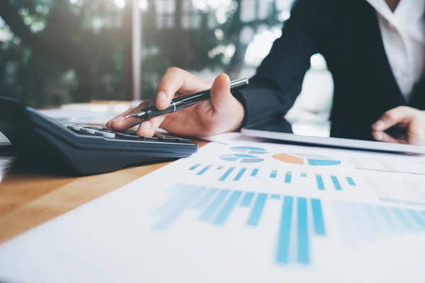 Female accountant or banker use calculator. — Stock Photo, Image