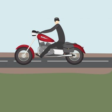 Yolun üstünde kırmızı bir motosiklet sürme motorcu 