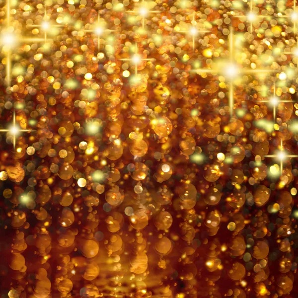 Gold und Bronze Regen funkelnder Lichter Bokeh Hintergrund Stockfoto