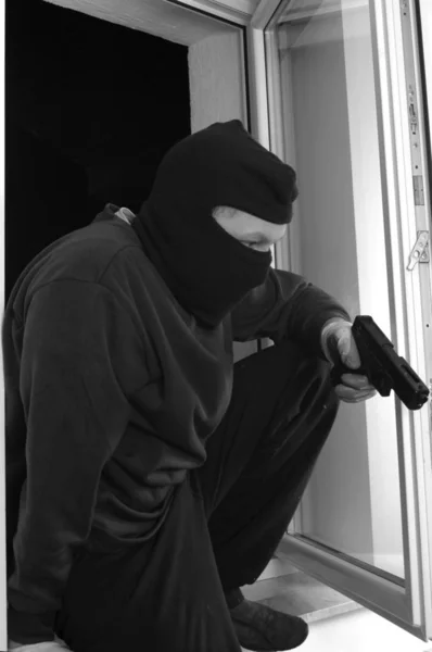Katil tabanca ile — Stok fotoğraf
