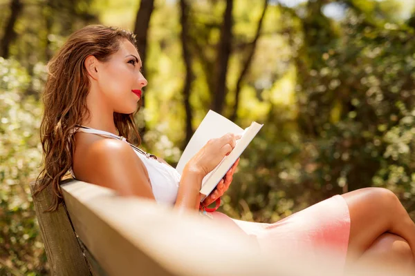 Young woman Relaxing In Sunny Forest — Stock Photo, Image