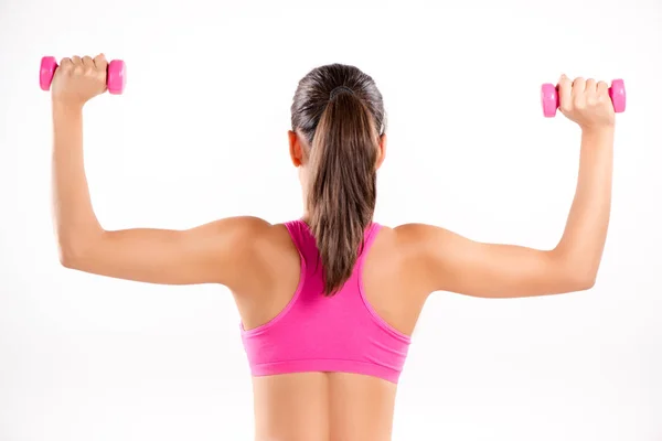 Mulher fazendo exercício para fortalecer os ombros — Fotografia de Stock