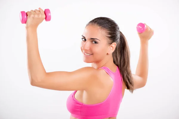 Mujer haciendo ejercicio para fortalecer los hombros — Foto de Stock