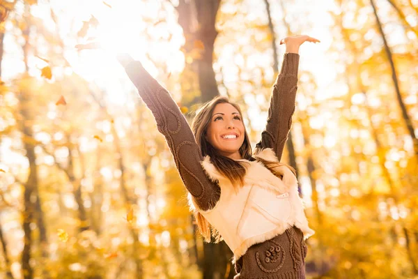 Woman having fun in sunny forest — Stock Photo, Image