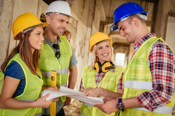 Construction architects review plan — Stock Photo, Image