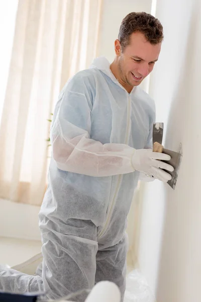 Man polijsten van de muur — Stockfoto