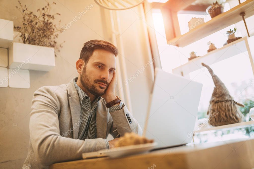 Businessman Working In A Cafe
