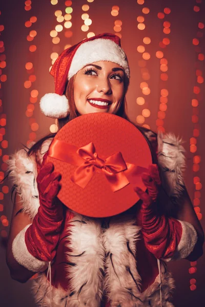 Woman in Santa Claus costume — Stock Photo, Image