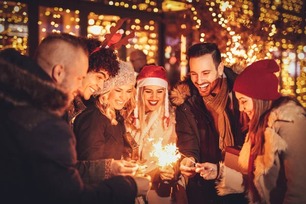 Friends celebrating Christmas — Stock Photo, Image