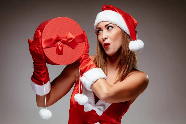 Beautiful Young Smiling Woman Santa Claus Costume Holding Red Present — Stock Photo, Image