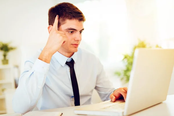 Young Handsome Pensive Businessman Looking Laptop Office — Stock Photo, Image