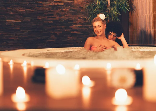 Beautiful Young Couple Enjoying Hot Tub Spa Centre — Stock Photo, Image