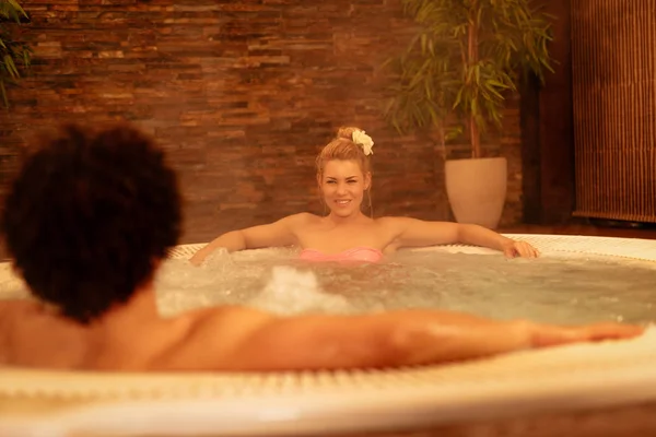 Beautiful Young Couple Enjoying Hot Tub Spa Centre — Stock Photo, Image