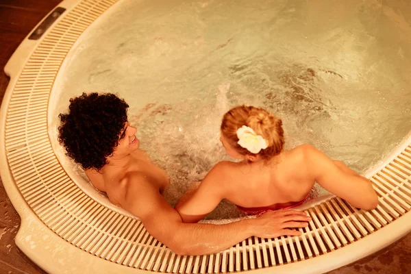 Top View Beautiful Young Couple Enjoying Hot Tub Spa Centre — Stock Photo, Image