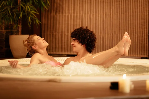 Beautiful Young Couple Enjoying Hot Tub Spa Centre — Stock Photo, Image