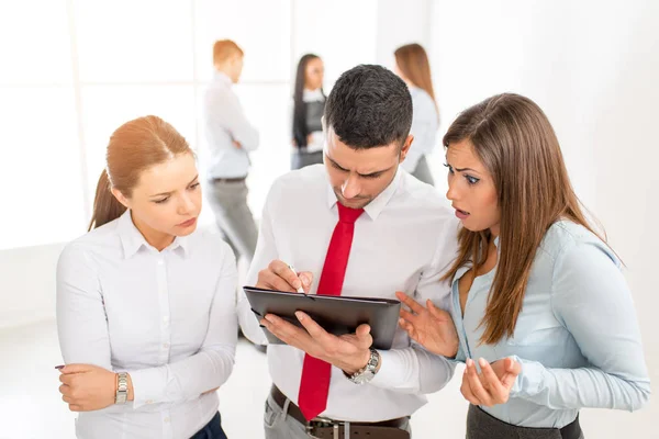 Three Young Colleagues Discussing Front Business Team — Stock Photo, Image