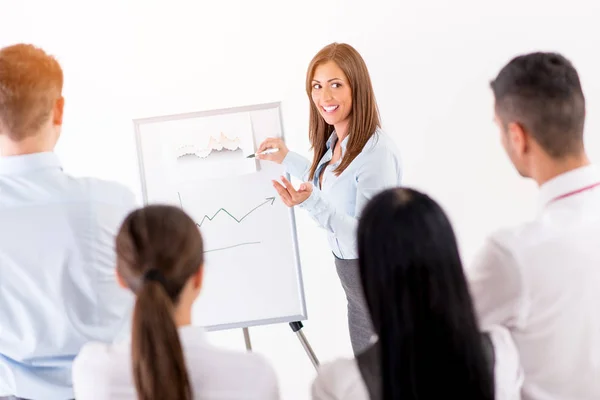 Businesspeople Having Meeting Office Young Businesswoman Standing Front Flip Chart — Stock Photo, Image