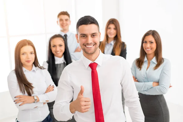 Successful Young Businessman Standing Proudly Young Business Team Looking Camera — Stock Photo, Image