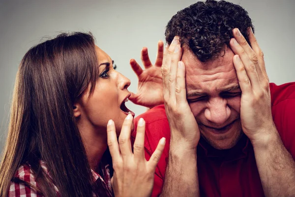 Angry Wife Shouting Her Husband Who Covered Head Her Hands — Stock Photo, Image