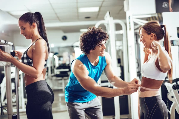 Fitness Instructor Measuring Woman Waist Workout Gym — Stock Photo, Image
