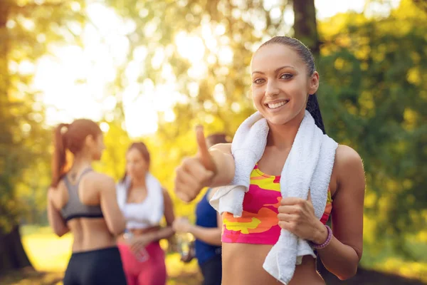 Sporty Smiling Woman Showing Thumb Training City Park — Stock Photo, Image