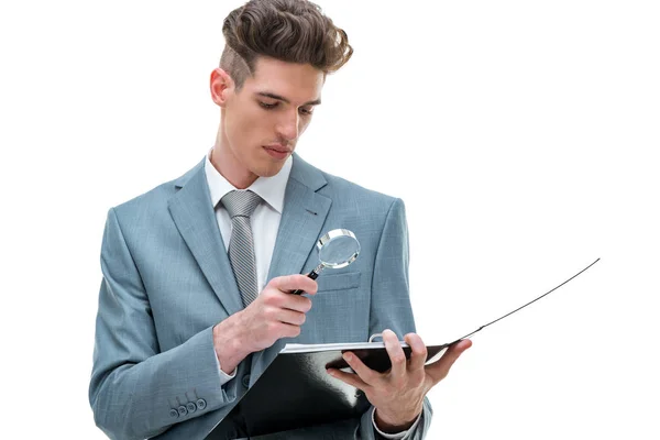 Young Businessman Carefully Checking Documents Using Magnifying Glass — Stock Photo, Image