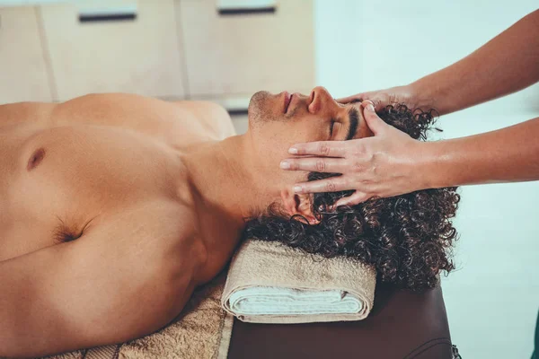Handsome Man Lying Massage Table Getting Healthy Facial Massage Young — Stock Photo, Image