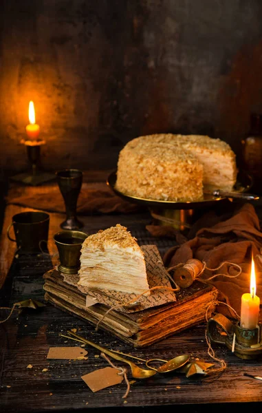 russian multilayered cake napoleon on golden cake stand