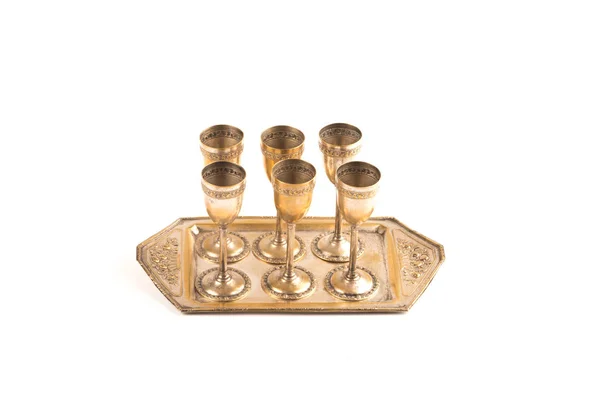 Set aus sechs Bronzegläsern mit einem Getränketablett — Stockfoto