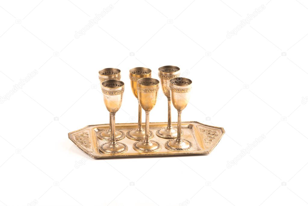 Set of six bronze glasses with a beverage tray
