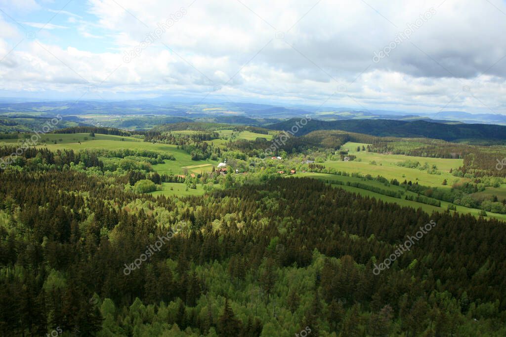 Spring Stolowe Mountain range- landscape near small, picturesque Pasterka village in Poland. Famous tourist attraction. Oldest mountains in Europe. View from Szczeliniec Wielki, Great Szczeliniec.