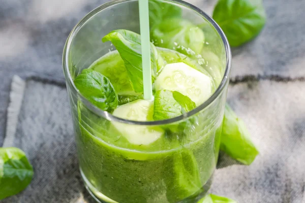 Green smoothie fresh cucumbers celery basil — Stock Photo, Image