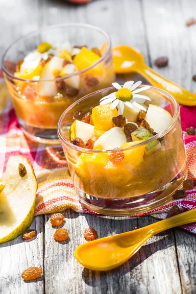 Fruity dessert pears nectarines raisins — Stock Photo, Image