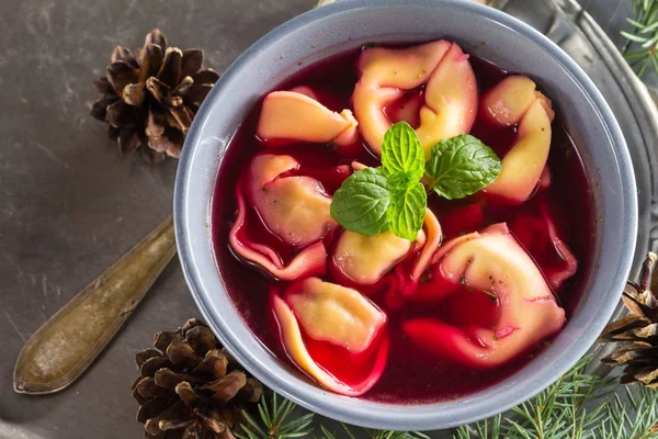 Traditional homemade red borscht dumplings Christmas table — Stock Photo, Image