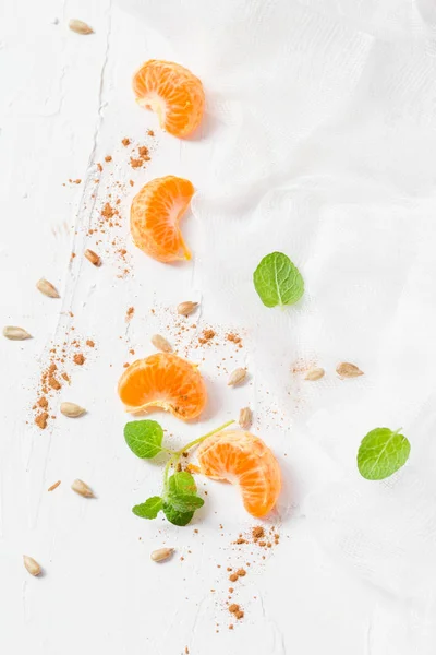 Fruit mandarin mint leaves sunflower seeds — Stock Photo, Image