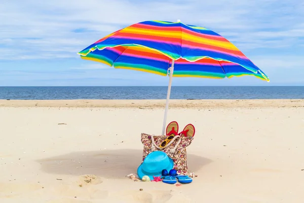 Sunshade bag sunbathers beach — Stock Photo, Image