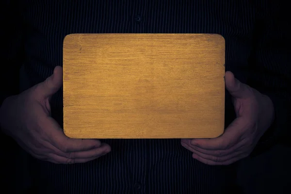 Wooden background hands man — Stock Photo, Image