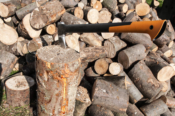 Cutting firewood with an ax. Firewood