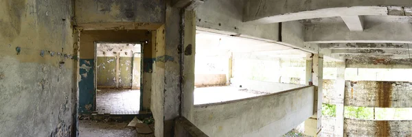 wide angle view of an old wall abandoned factory building