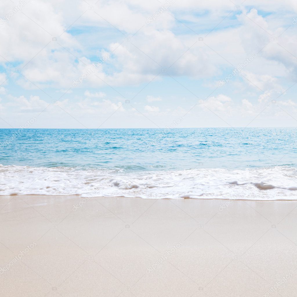 View of nice tropical beach with white sand and blue water