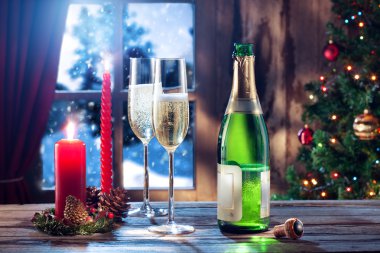 champagne with candles and gifts on color back clipart