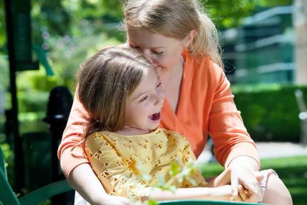 Portrait of happy mother with daughter having good time in summer environment — Stock Photo, Image