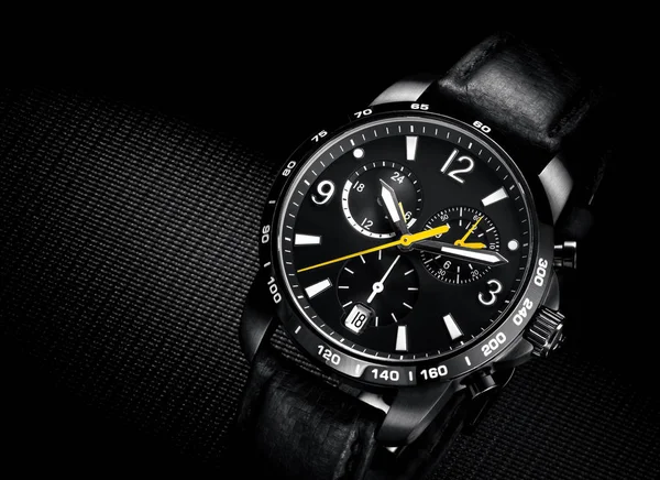 Close up view of nice man's wrist watch on black background — Stock Photo, Image