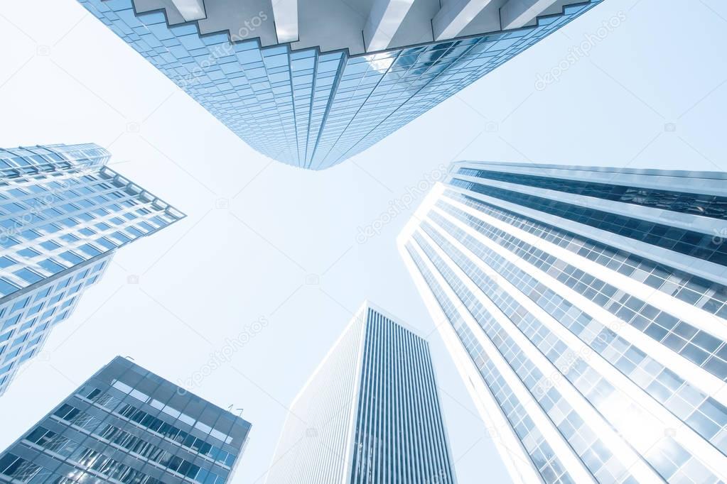 View of modern blue colored contemporary office city buildings  