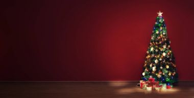 Noel ağacı ve kapalı bazı hediye kutuları görünümünü güzel dekore edilmiş
