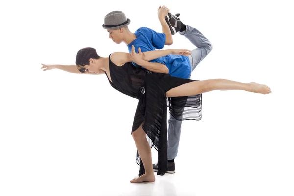 Dos bailarines de ballet modernos en figura de acción dinámica, sobre fondo blanco — Foto de Stock