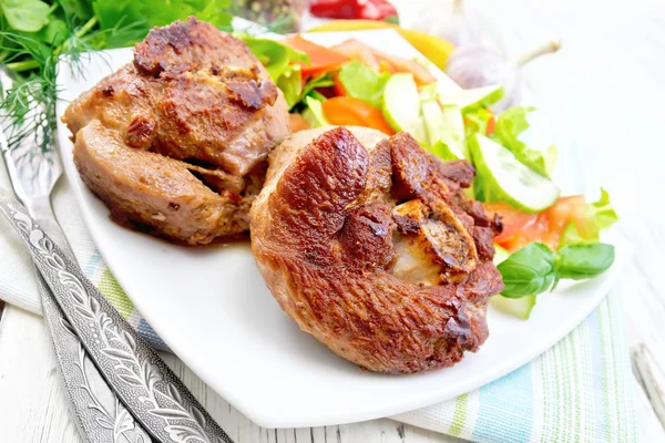 Turkey steak roasted with vegetables on light board — Stock Photo, Image