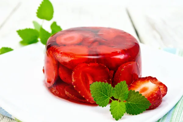 Jelly strawberry with mint on table — Stock Photo, Image